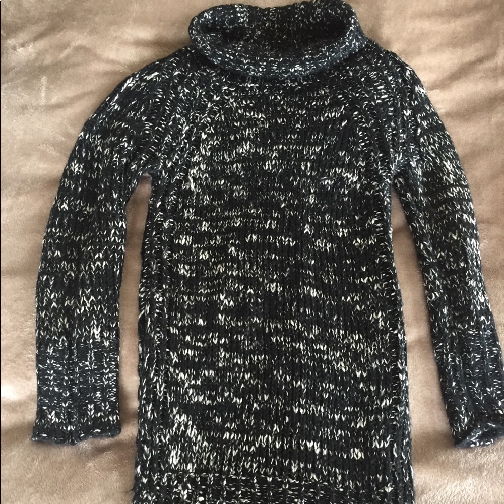 Long sweater, long sleeves, super soft and warm.